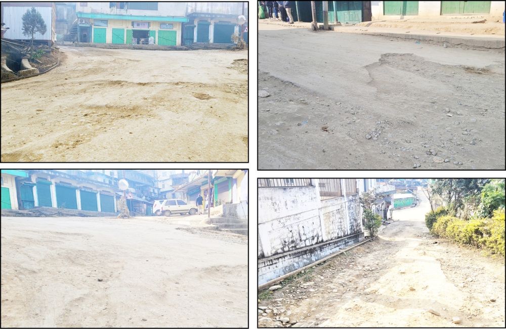 Scene of the deplorable road condition in the main town area of Phek town. Vehicle users have been facing hardship to ply along the unattended route. (Morung Photo)